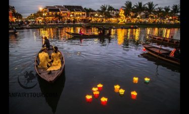 Boat ride on Hoai river with lantern dropping