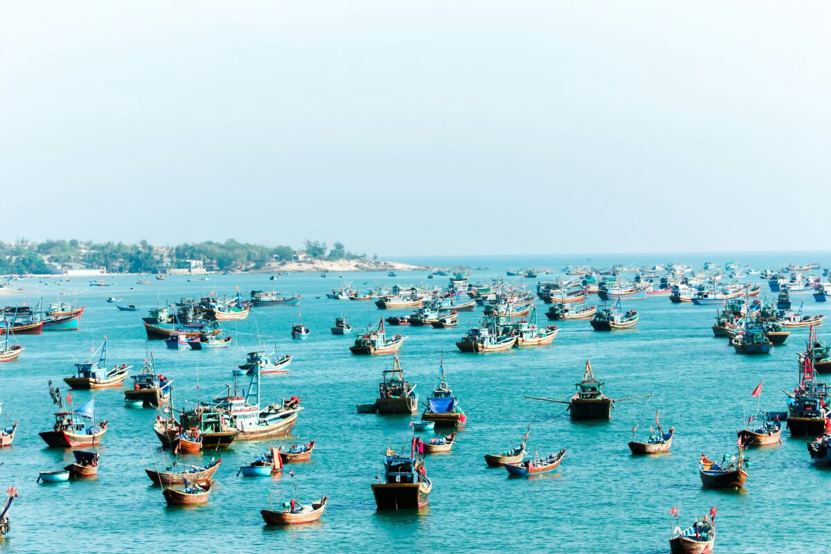 Fishing boats on turquoise water off the central Vietnam coast